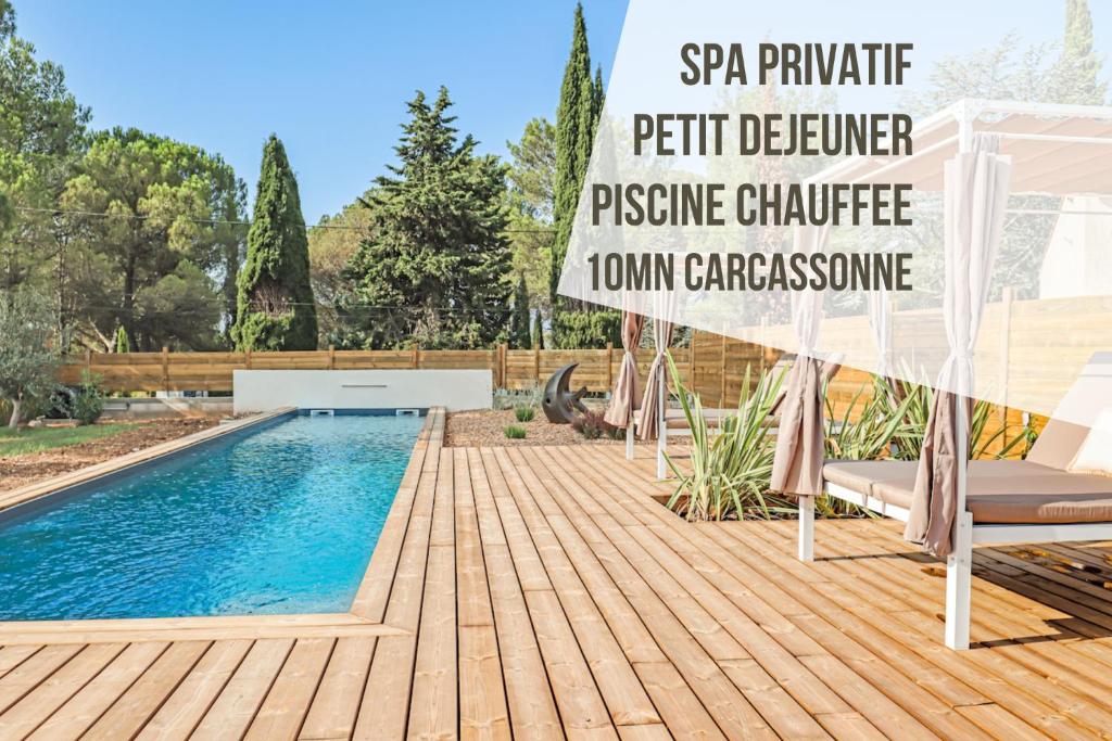 a swimming pool in a backyard with a sign that reads spa private perl dealer pressure at Les Gîtes de Laure - L'Eden Romantique, B&B, Spa privatif et Petit Déjeuner, Couloir de nage, 10mn Carcassonne in Malves