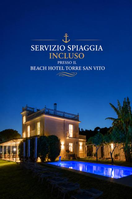 a building with a sign for a hotel at night at Primavilla Relais in Gaeta