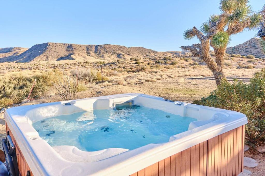 a hot tub in the middle of the desert at The Giddyup in Pioneertown