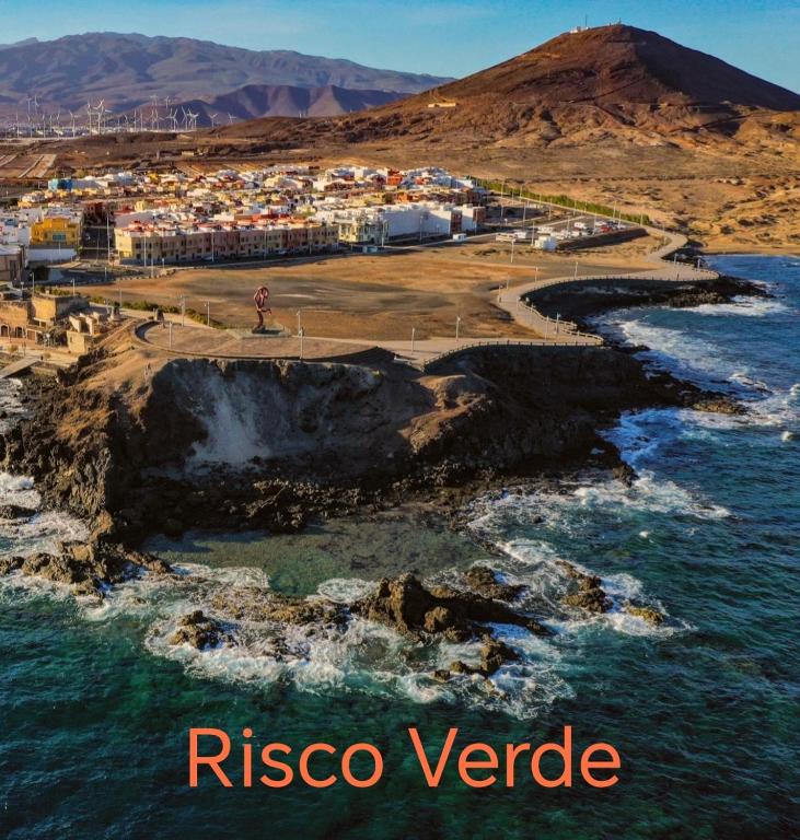 an aerial view of risco vender island at Rincón Mirador Risco Verde in Arinaga