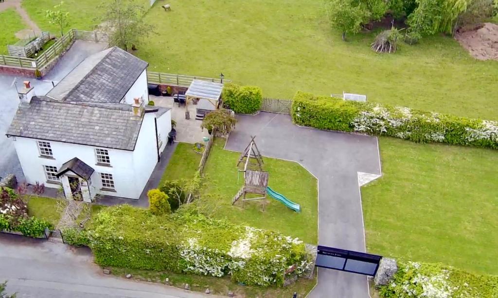 an overhead view of a white house with a yard at Southview Farm, Hambleton, Poulton-Le-Fylde in Hambleton