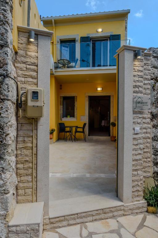 an external view of a house with a patio at Corfu Spanos House in Sokraki in Sokrákion