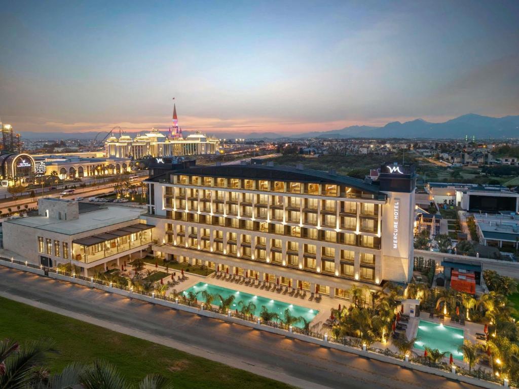 an aerial view of a hotel at night at Mercure Antalya Belek in Belek