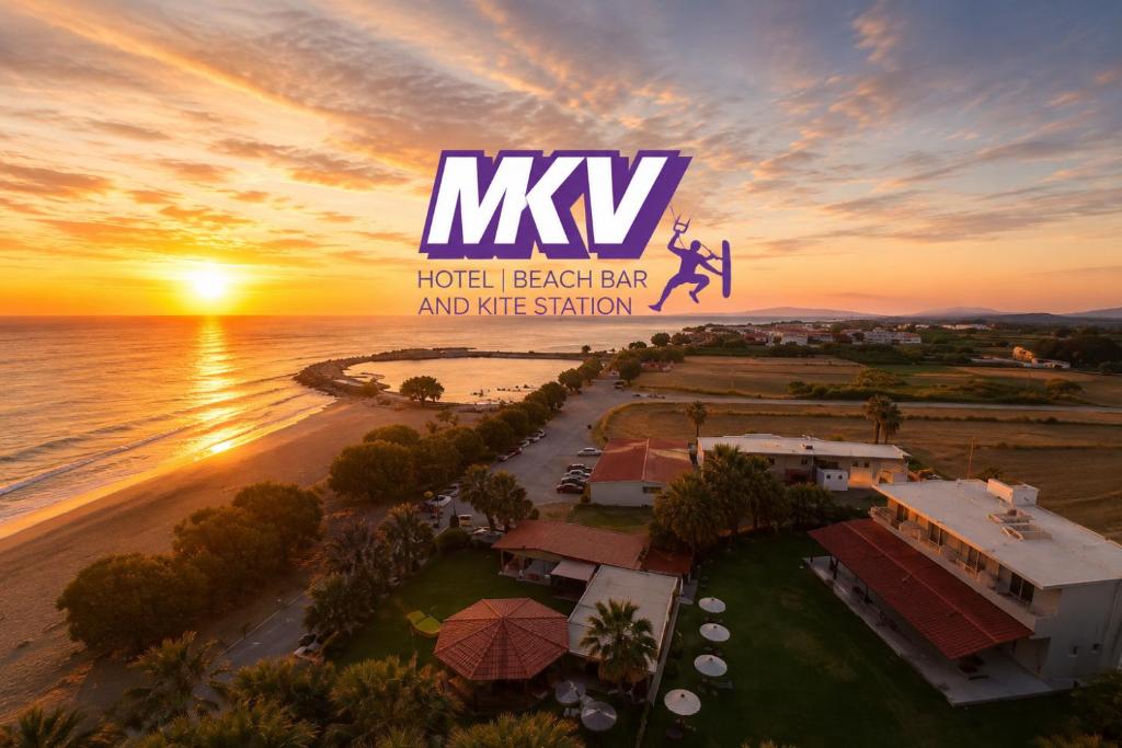 an aerial view of a resort with the sunset at Michael’s Vacancies in Fánai