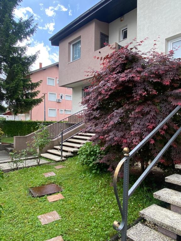 a set of stairs leading up to a building at Holiday Home Ilidza Ella in Sarajevo