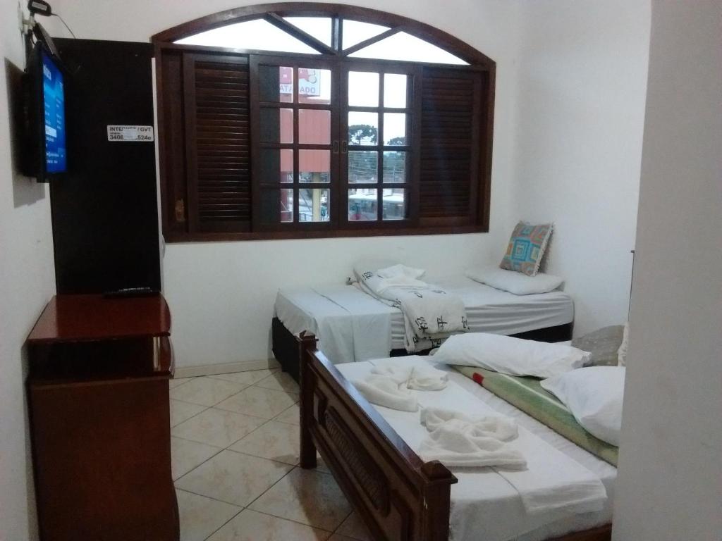Postel nebo postele na pokoji v ubytování Hotel Dal Gobo