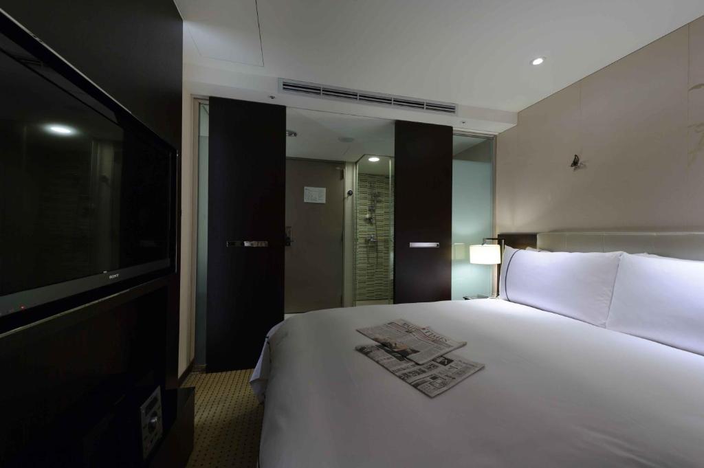 Postel nebo postele na pokoji v ubytování K Hotel Taipei Dunnan