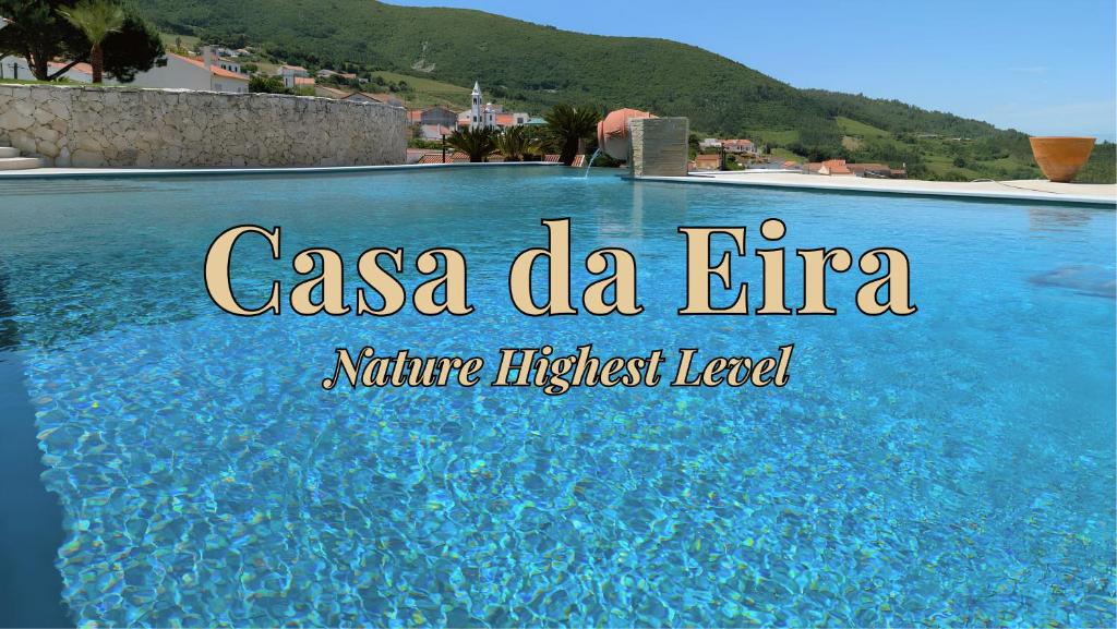 a sign that reads casa de la erica nature highest level in a pool at Casa da Eira in Cadaval