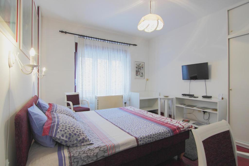 Krevet ili kreveti u jedinici u objektu White Apartment