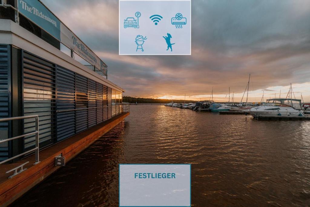 a view of a marina with boats in the water at Floatinghouse Hideaway LP25 in Klitten