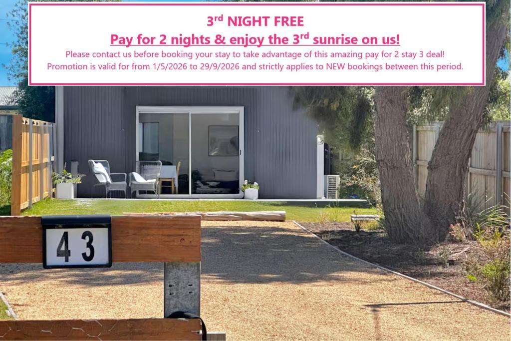 a flyer for a night free for nights and enjoy the sunrise on at Two Gums Cottage in St Helens