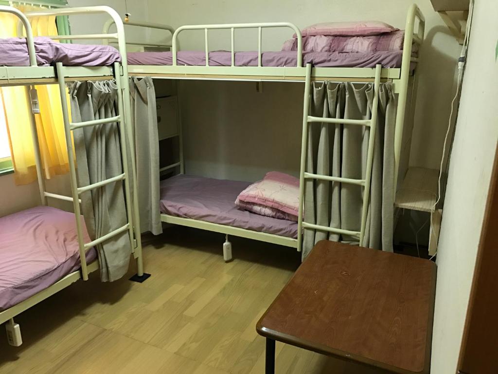 Postel nebo postele na pokoji v ubytování IM guest house
