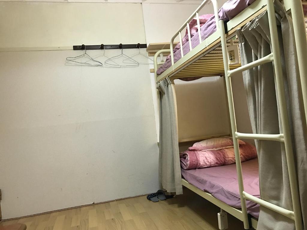 Postel nebo postele na pokoji v ubytování IM guest house