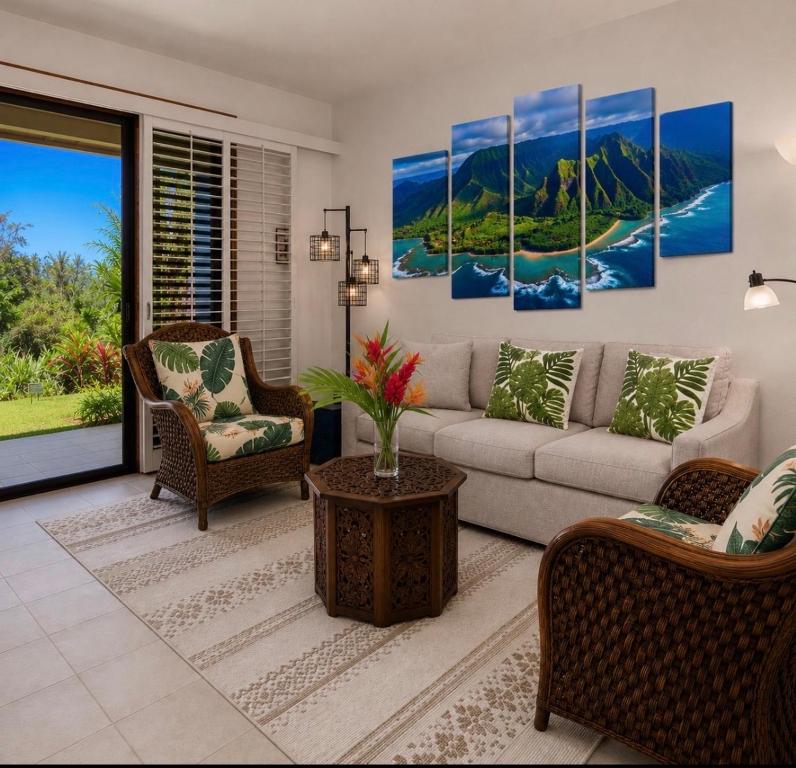 a living room with a couch and chairs at Poipu Beach Condo with AC and Pool in Koloa