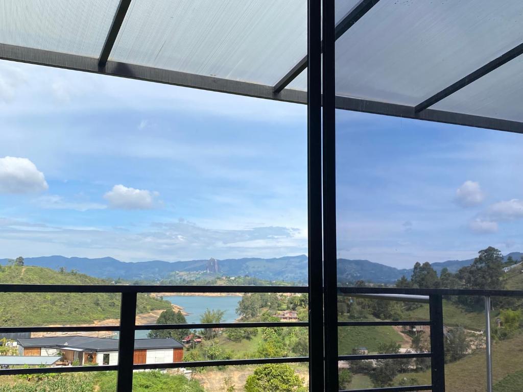 a view from the window of a house at Cabaña XAMAI in La Pradera