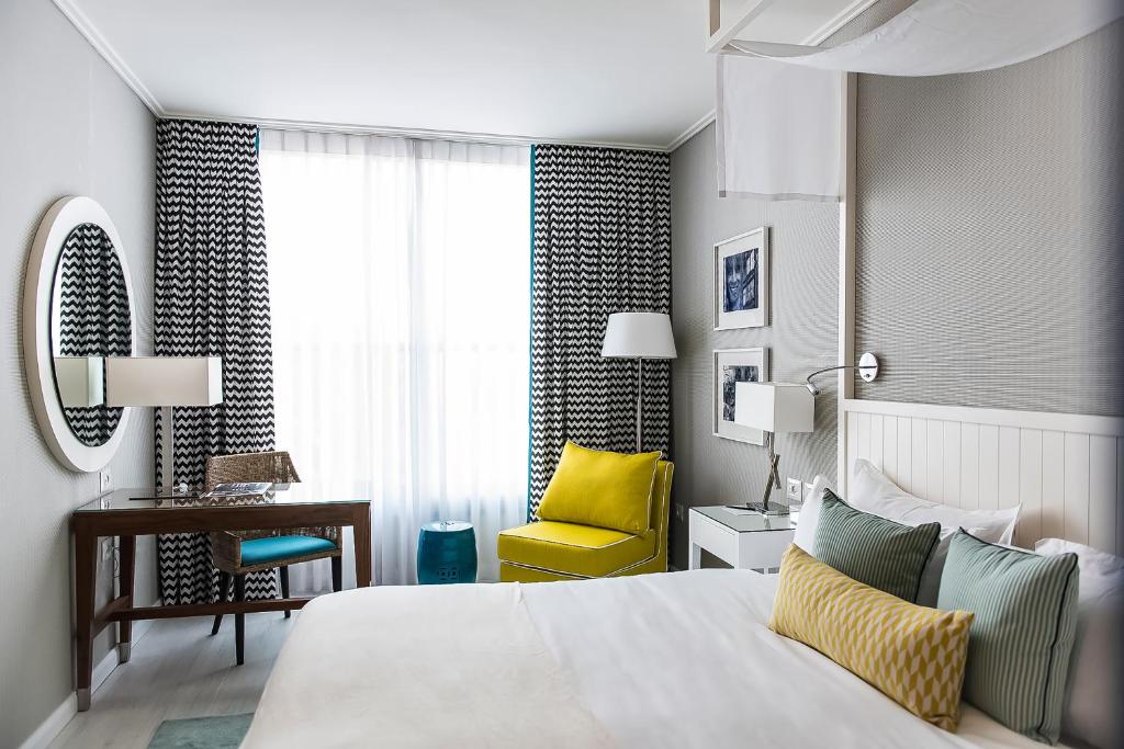 Postel nebo postele na pokoji v ubytování Melody Hotel - an Atlas Boutique Hotel