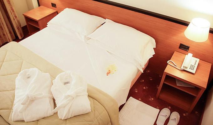Cama o camas de una habitación en Hotel Executive Meeting & Events