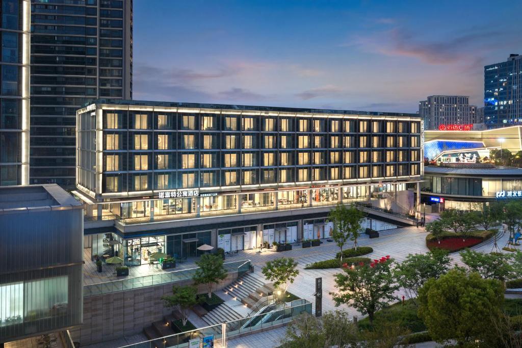 an overhead view of a building in a city at Novotel Living Hangzhou International Convention Center in Hangzhou