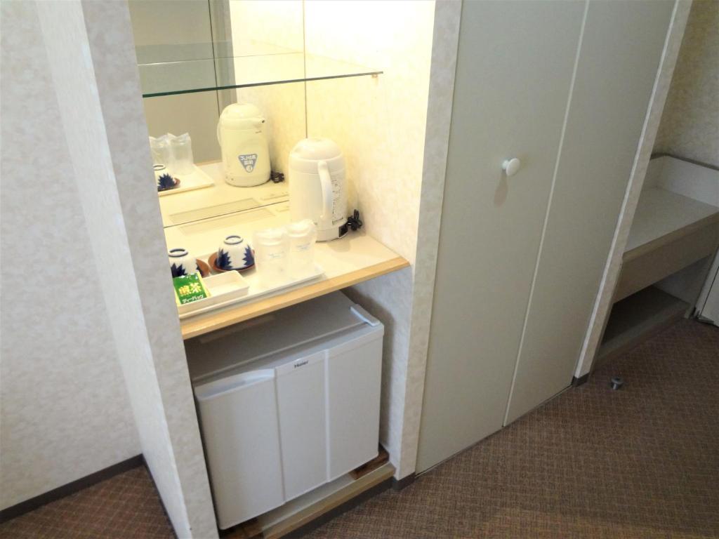 Kuchyň nebo kuchyňský kout v ubytování Toyama Chitetsu Hotel