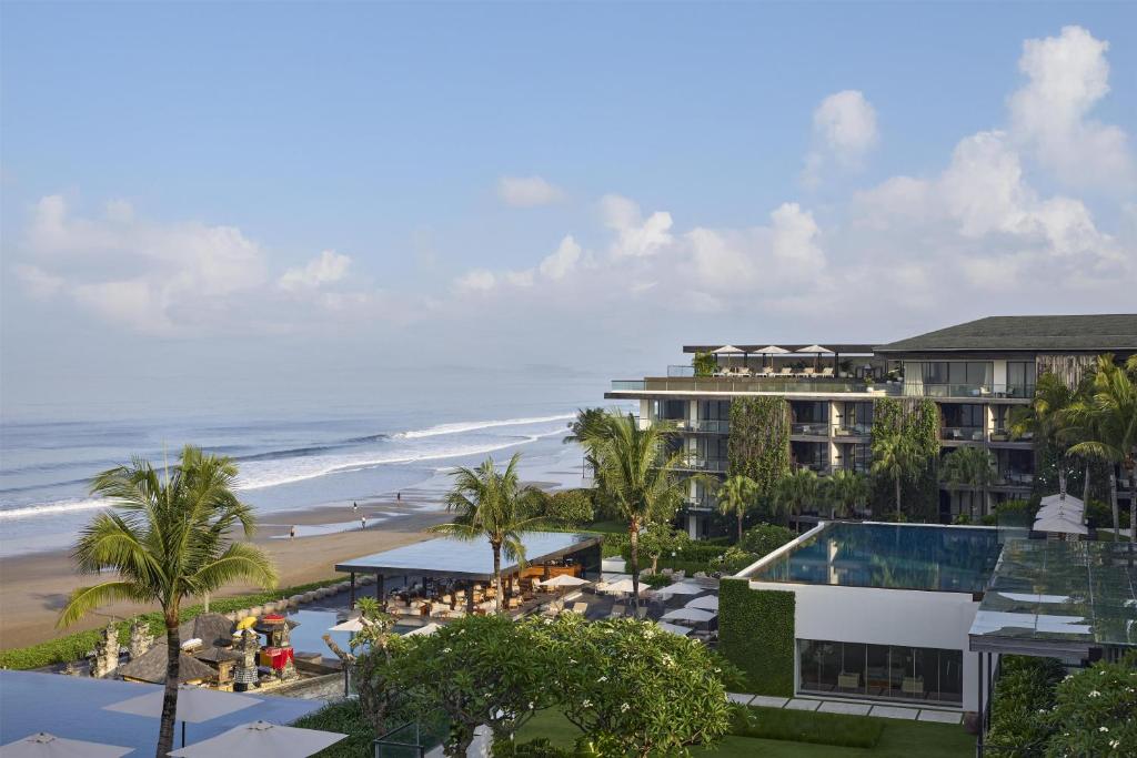 an aerial view of a hotel and the beach at Alila Seminyak in Seminyak