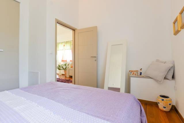 Posteľ alebo postele v izbe v ubytovaní Apartment Varga