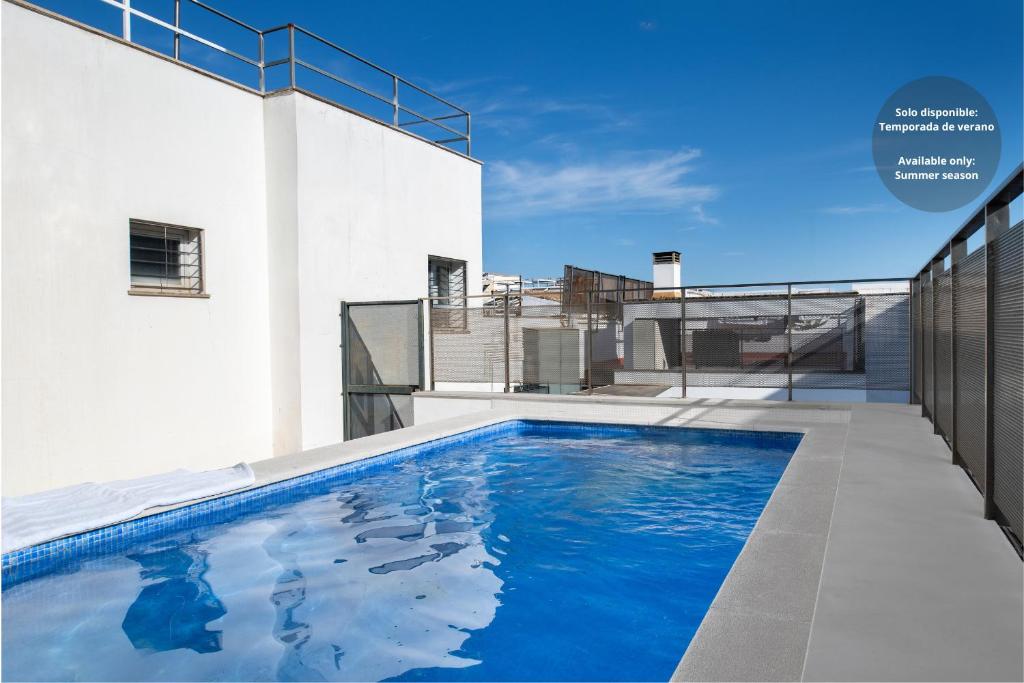 Urban Oasis Apartment with Pool and Parking