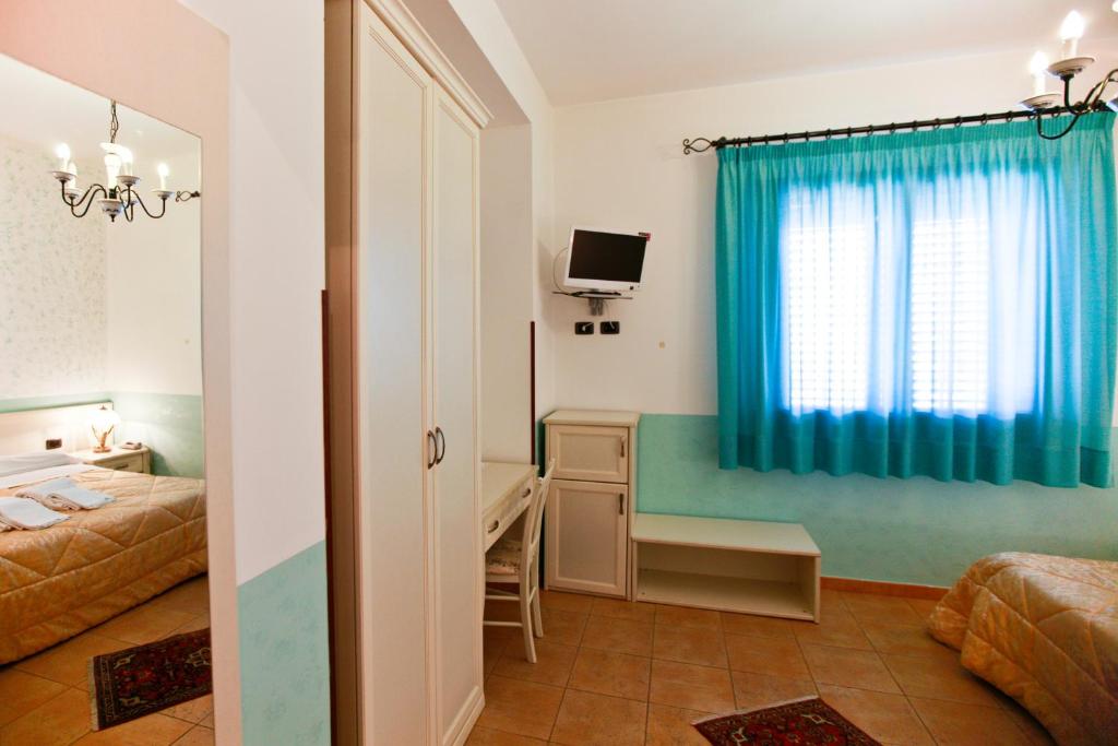 Postel nebo postele na pokoji v ubytování History Hotel