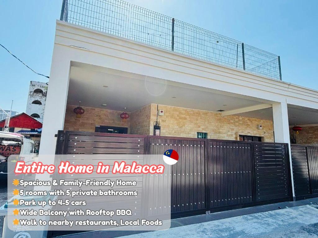 an entrance to a building with an entrance home in malaza at Spacious Home in the Heart of Melaka for Families 10 pax, Chill & Relax at Extra Wide Balcony, COMFY HILL in Malacca