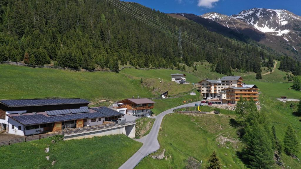 an aerial view of a resort in the mountains at Berghotel & Gasthof Marlstein in Oetz