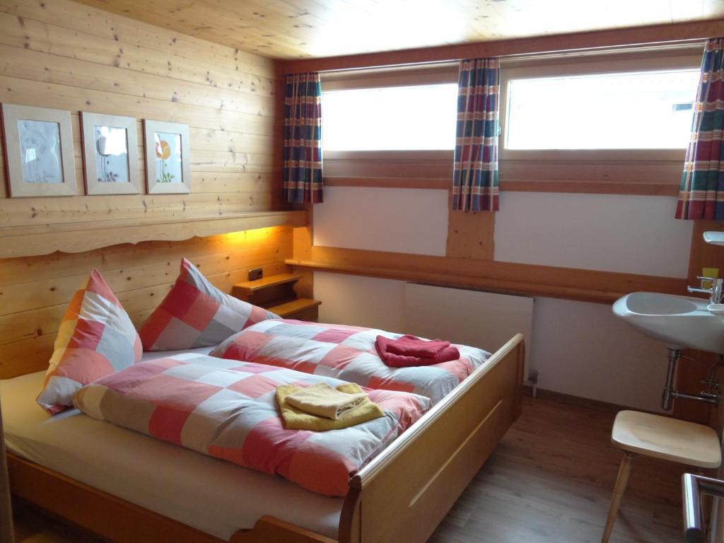 Postel nebo postele na pokoji v ubytování Haus Mittergries