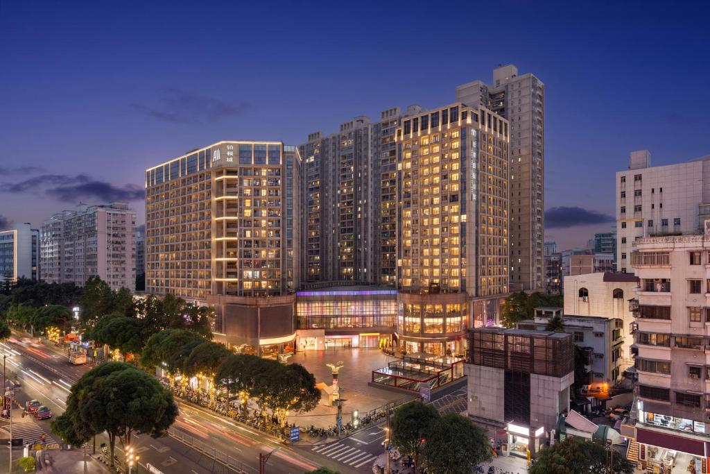 a large building with a street in front of it at Foshan Poltton International Serviced Apartment in Foshan