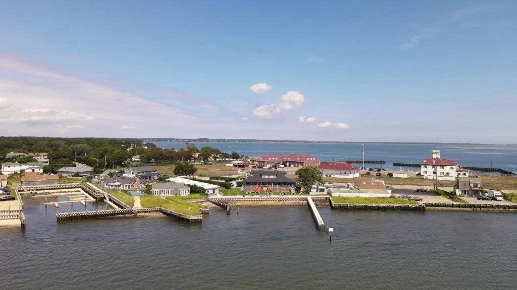an aerial view of a small town on the water at The Inn Spot in Hampton Bays