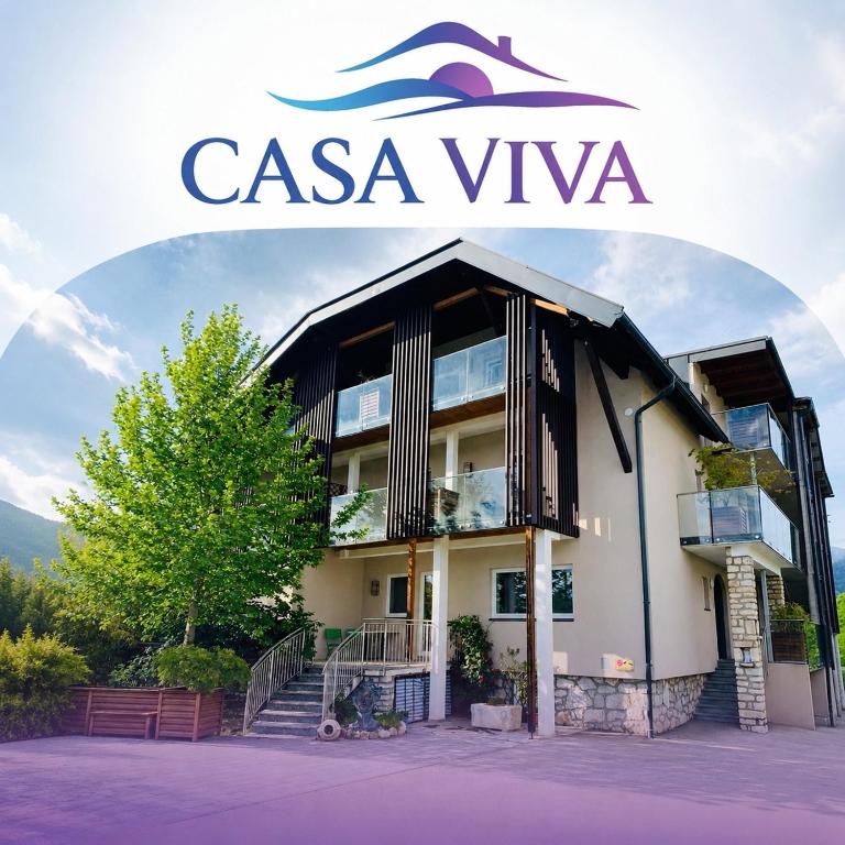 a building with a sign that reads casa viva at CASA VIVA Panorama Suites in Villach