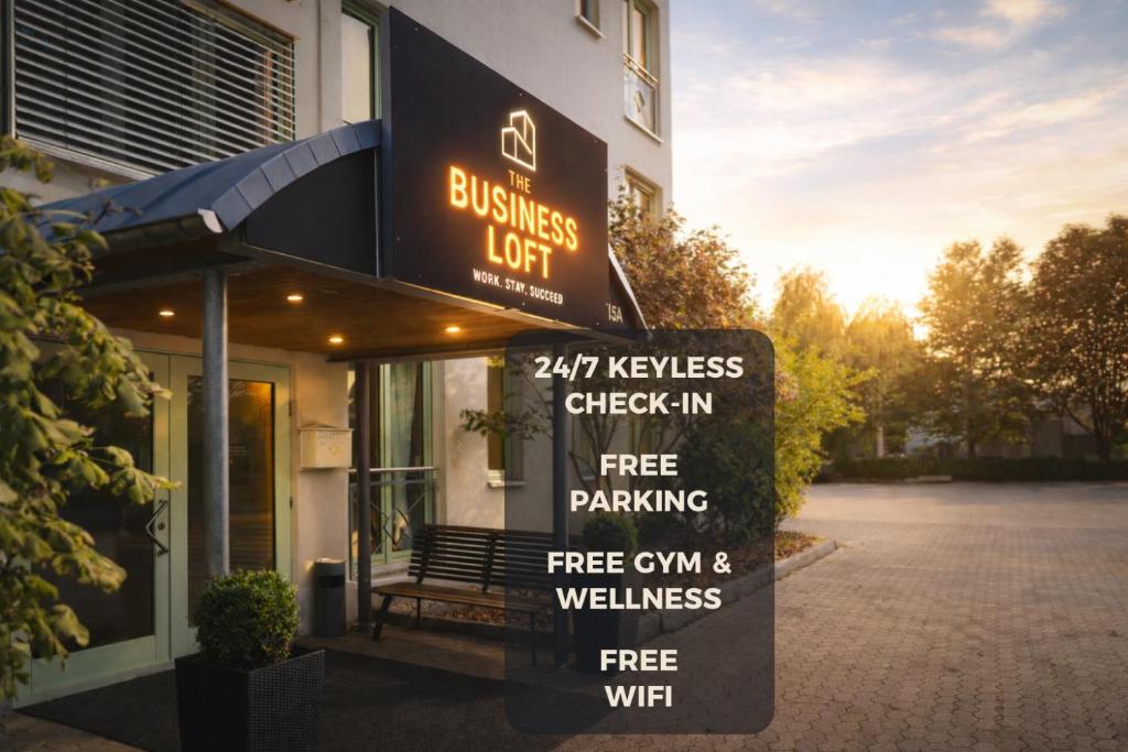 a sign in front of a building with a business sign at The Business Loft in Wolfsburg