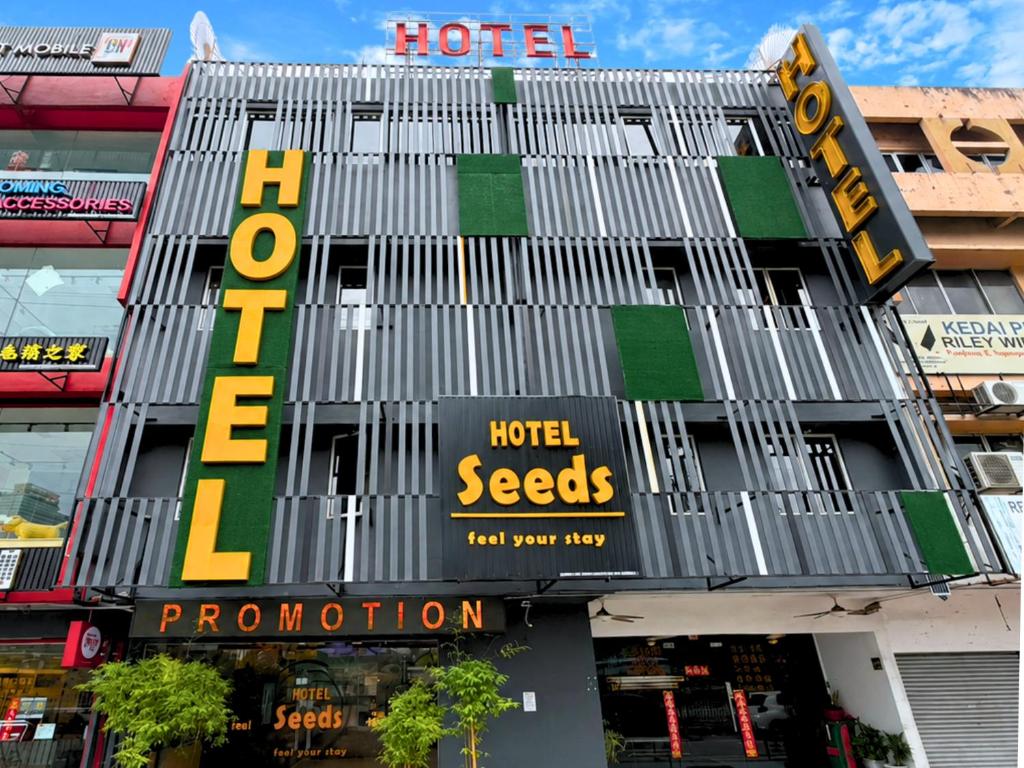 a hotel with a sign on the front of it at Seeds Hotel Cheras Maluri in Kuala Lumpur