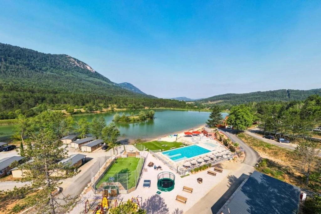 an aerial view of a resort with a lake at Camping 4 étoiles - Piscine - ccbgbac in Arques