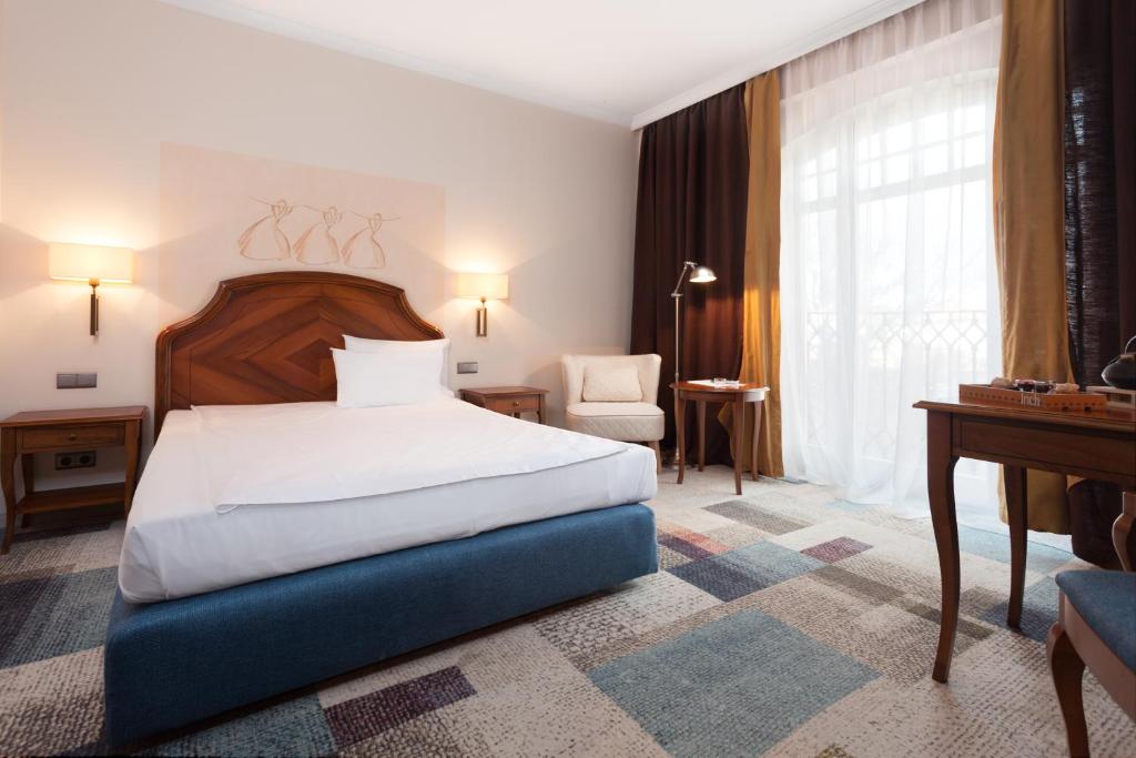 Postel nebo postele na pokoji v ubytování Hotel Rejs