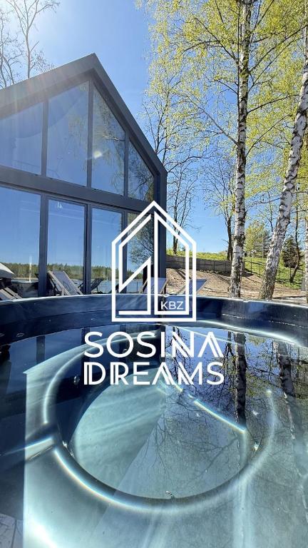 a house with a sign that reads sosining dreams at Sosina Dreams in Jaworzno