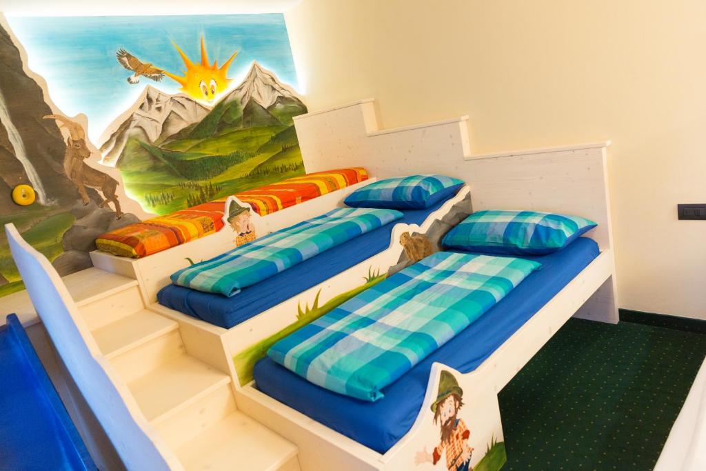 Postel nebo postele na pokoji v ubytování Hotel Touring
