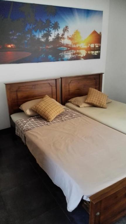 Postel nebo postele na pokoji v ubytování Hotel 100