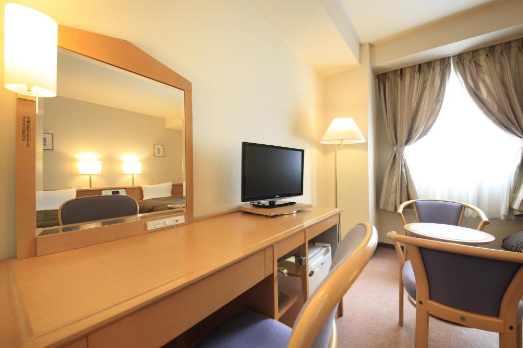 TV a/nebo společenská místnost v ubytování Hotel Morschein