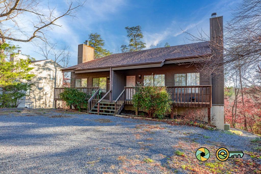 a large house with a driveway in front of it at Senedo Springs Duplex #90B in Basye
