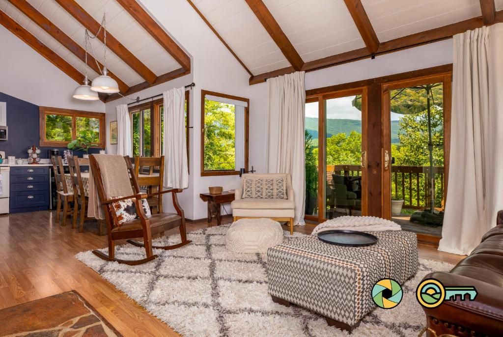 a living room with a couch and a table at The Hill T-19: Eagle's Nest in Basye