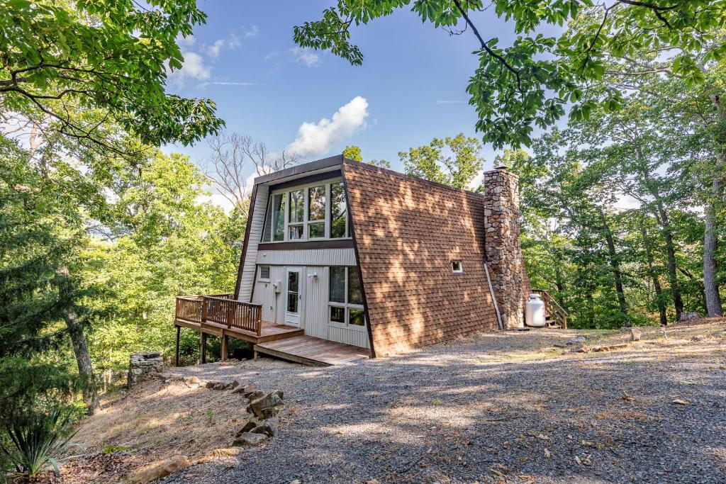 a brick house in the middle of the forest at 1186 Fairway Drive: Country Squire in Basye