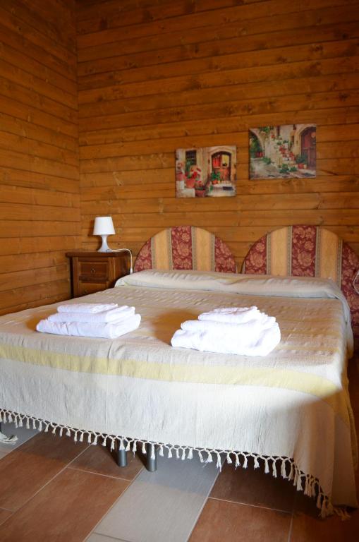 A bed or beds in a room at Il Giardino Del Sole