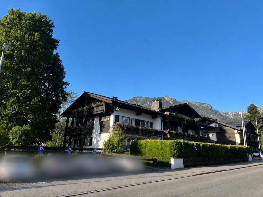 a house on the side of a street at Gästehaus Immenhof in Oberstdorf