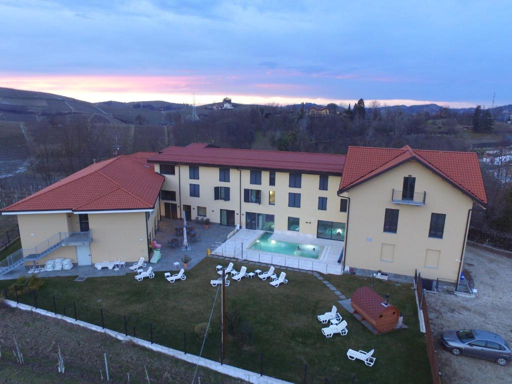 an aerial view of a building with a yard at SPA Roero Relax Resort in Canale