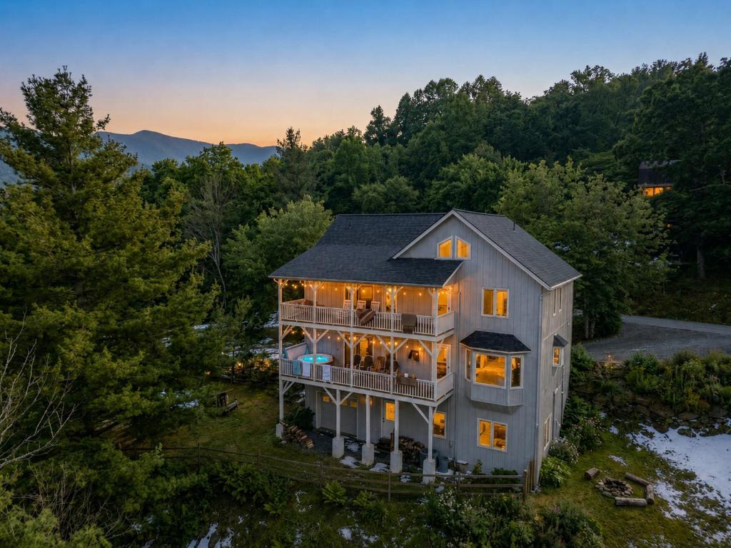 an aerial view of a house with a roof at Flat Top Lodge in Blowing Rock