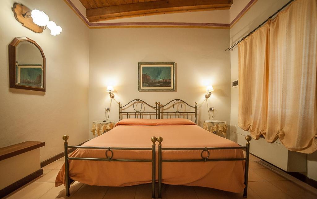Postel nebo postele na pokoji v ubytování Park Hotel Elefante