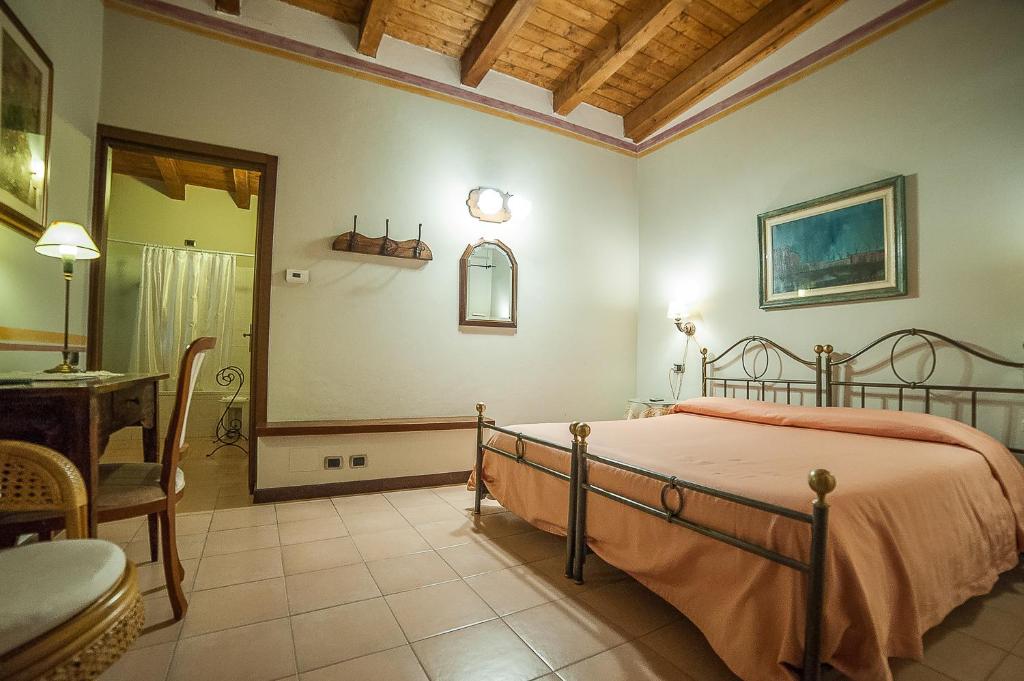 Postel nebo postele na pokoji v ubytování Park Hotel Elefante